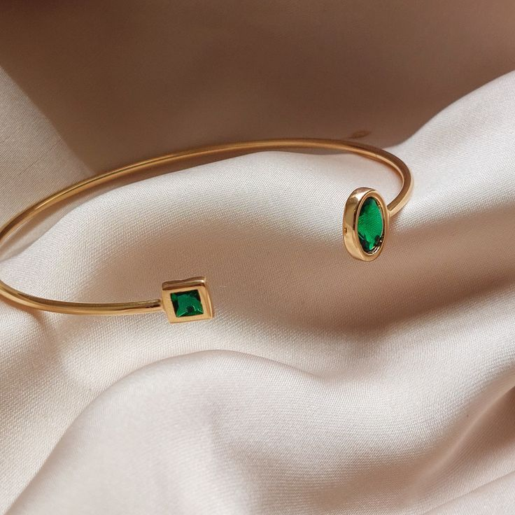 Gemstone-Encrusted Gold Cuffs