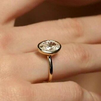 oval cut solitaire engagement ring