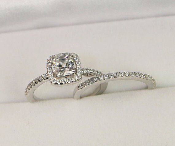halo engagement ring with a pavé wedding diamond band